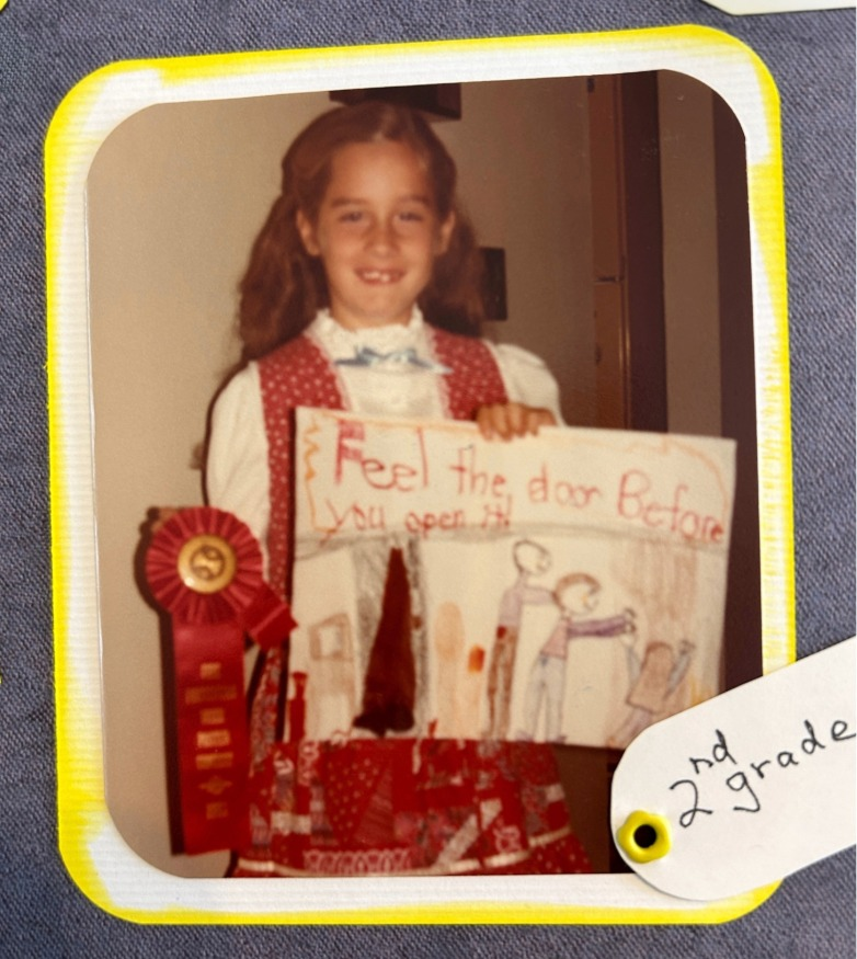 Keri Rosemond in the second grade with a piece of art